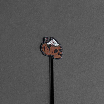 The Peppermint Mocha Stir Stick from the Death Wish Coffee Flavor Skull Stir Stick Set.