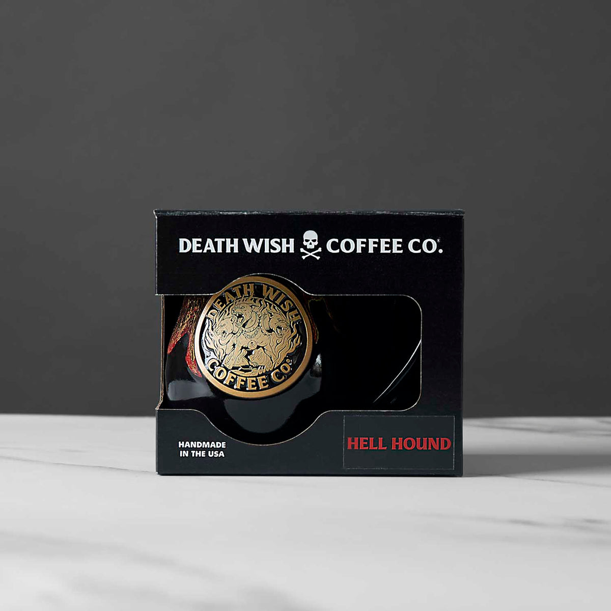 A detail shot of the Death Wish Coffee Hell Hound Mug inside its custom display box.
