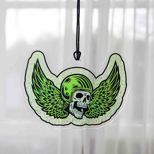 The Death Wish Coffee Power Surge Suncatcher hanging in a window.