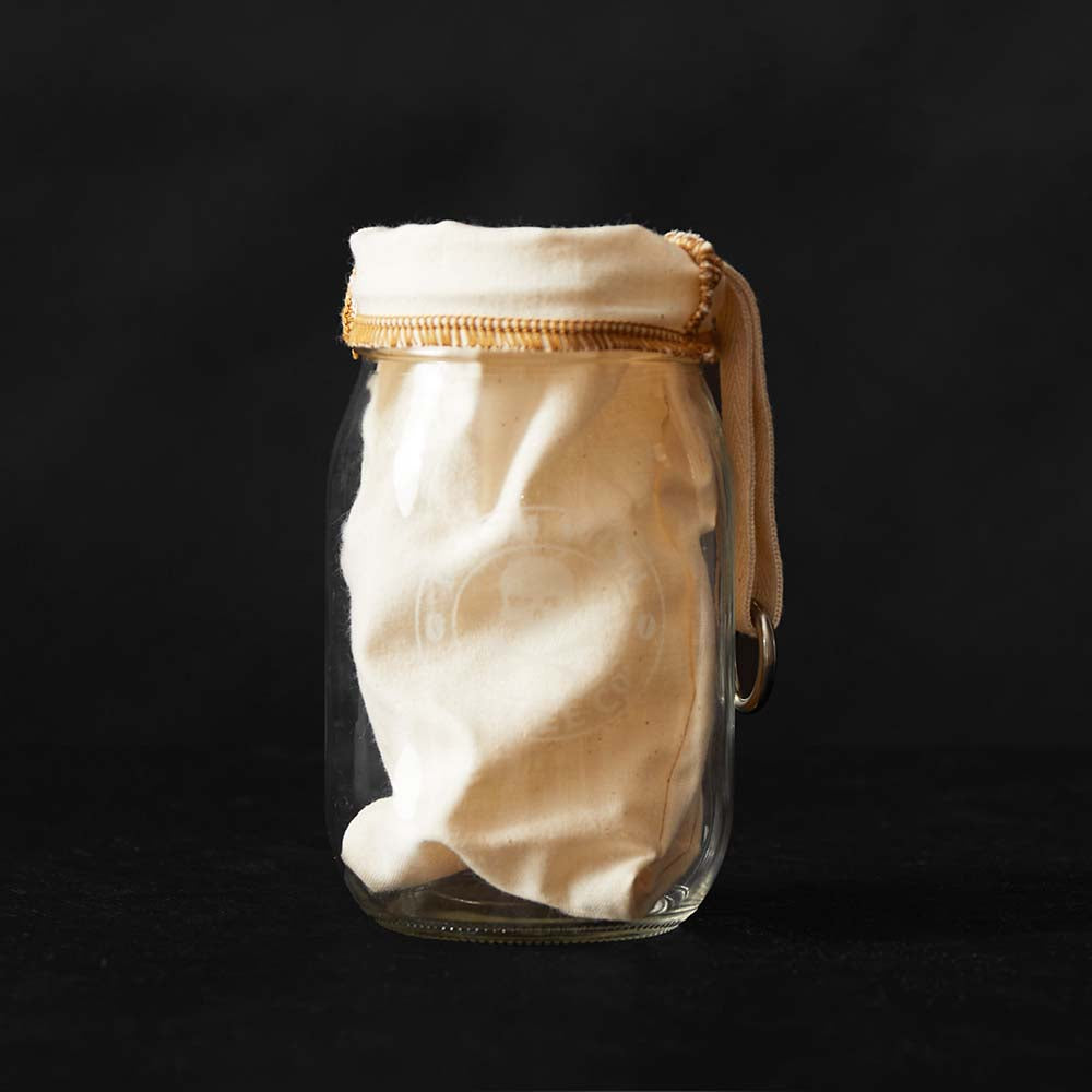 The Coffee Sock Reusable ColdBrew Filter - Hikers Edition placed over the top of a mason jar.