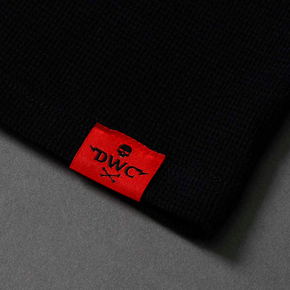 The woven label on the Death Wish Coffee Self Centered Waffle Knit.