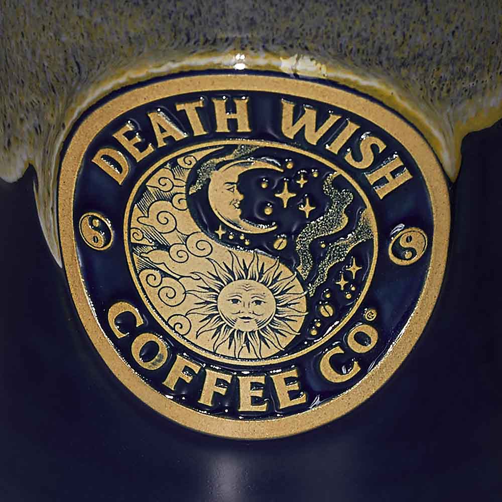 A close up of the Death Wish Coffee Divine Balance Mug.