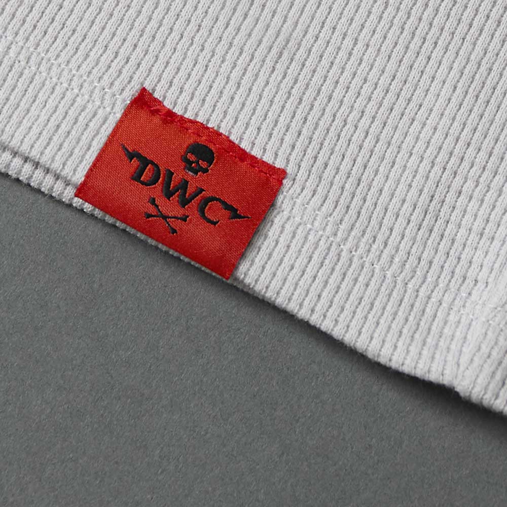 The woven label on the Death Wish Coffee Rolling Bones Women's Waffle Knit.