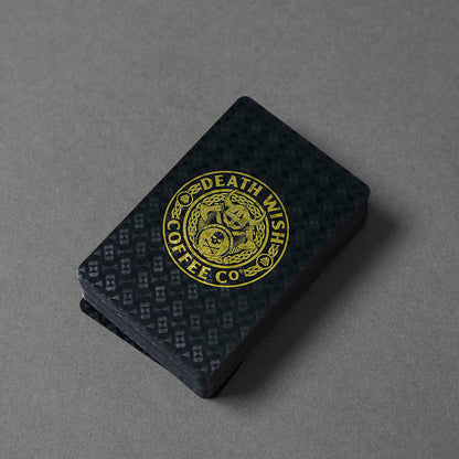 A stack of the Death Wish Coffee Odin's Deck of Destiny Playing Cards.