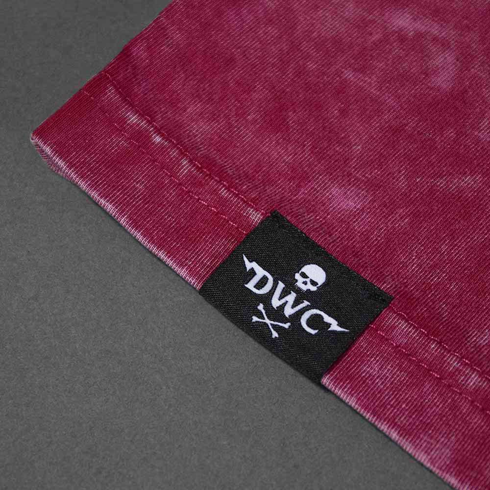 The woven label on the Death Wish Coffee Red The Room Tee.