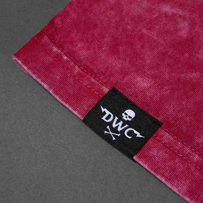 The woven label on the Death Wish Coffee Red The Room Tee.