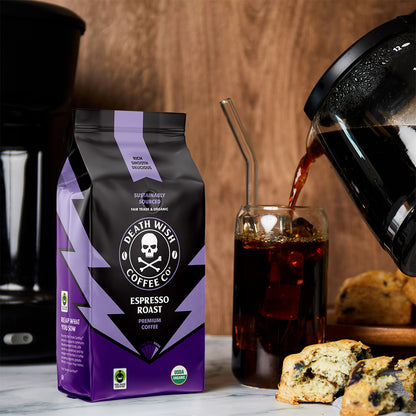 Pouring Espresso Roast Death Wish Coffee into a cup.