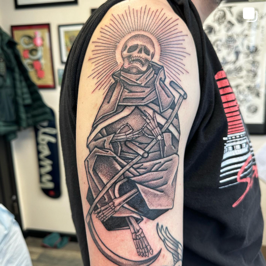A picture of a skeleton tattoo done by Peter Clarke of Dead Presidents Lounge.