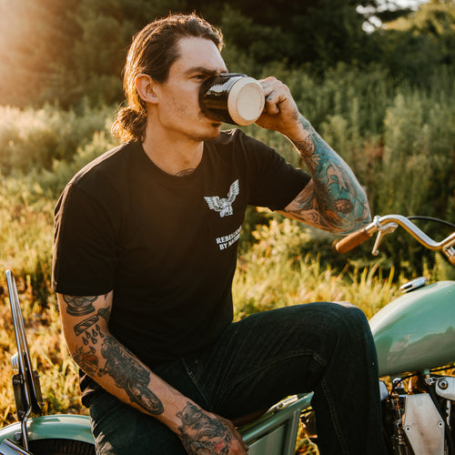 Drinking coffee in the Death Wish Coffee Rebellious by Nature Tee