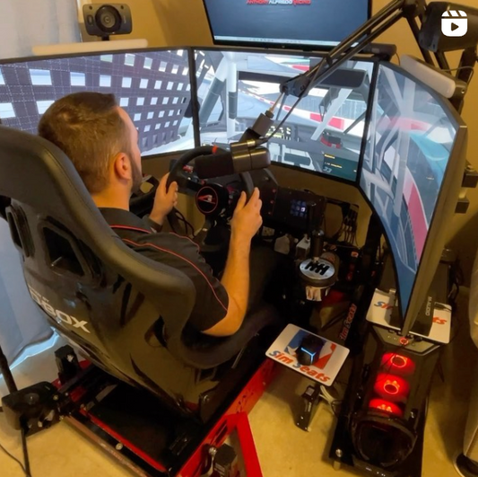 Anthony Alfredo practicing for the Daytona 500 with a driving simulator.