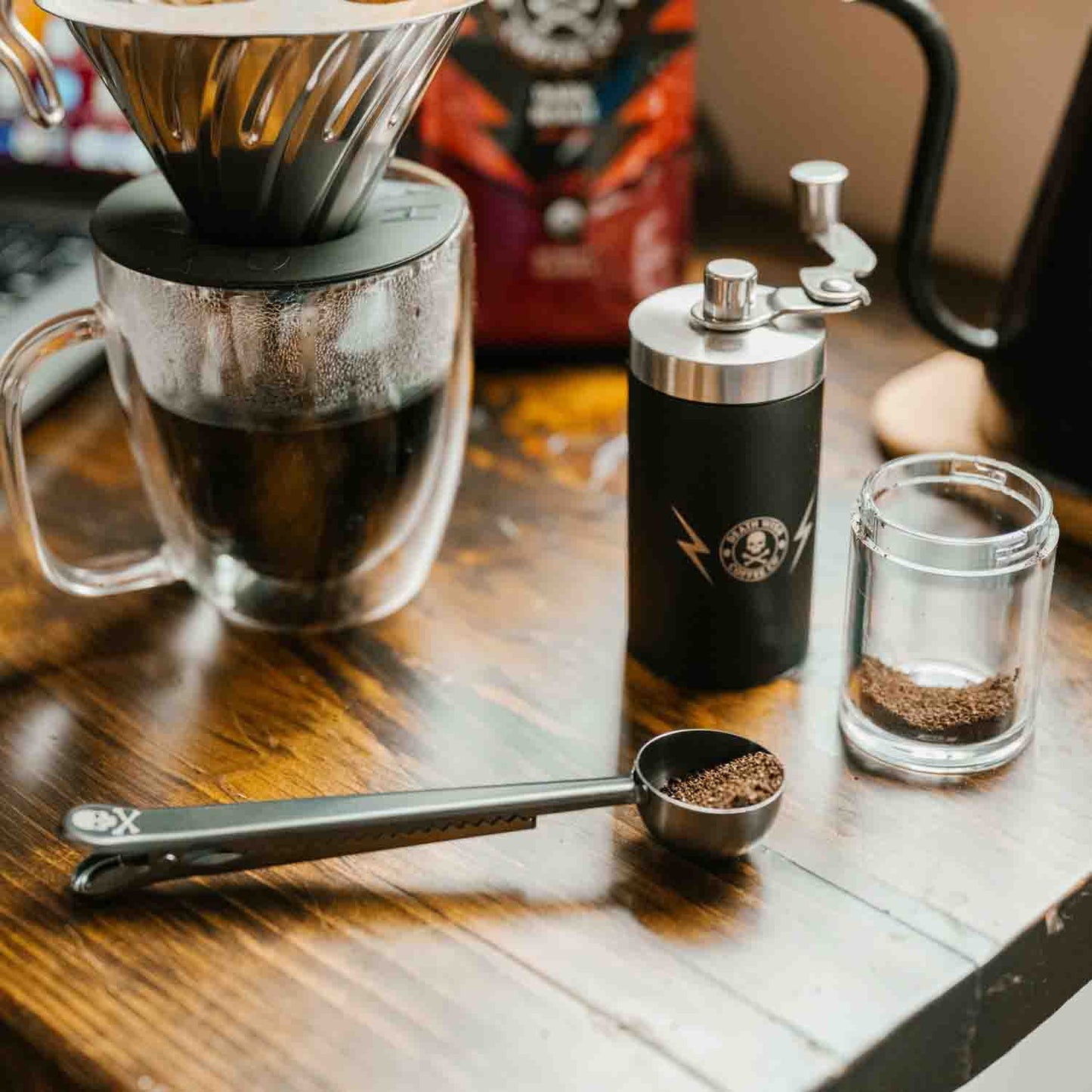 Brewing coffee using the Death Wish Coffee Scoop, Hand Grinder & Hario Coffee Dripper.