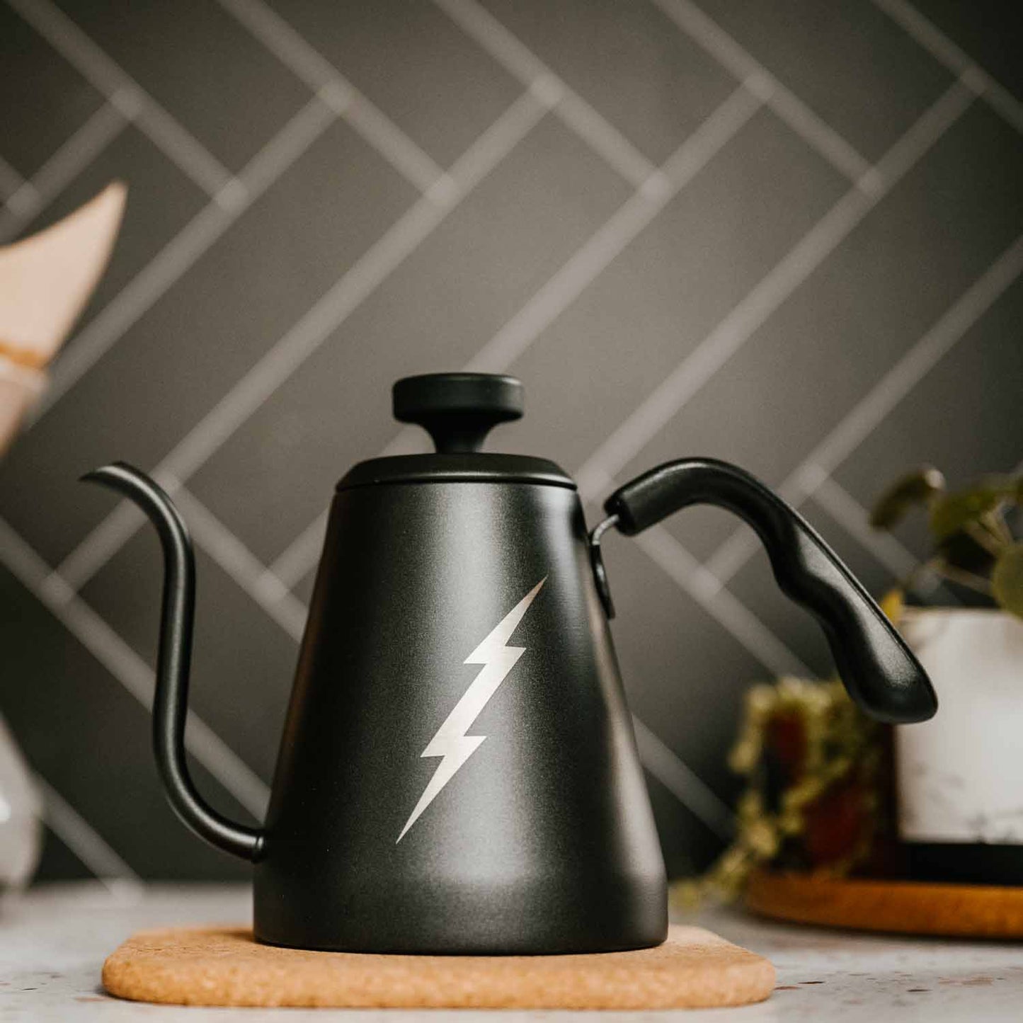 Death Wish Coffee Stovetop Gooseneck Kettle on the counter.